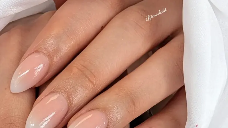 Glossy milky nude almond nails