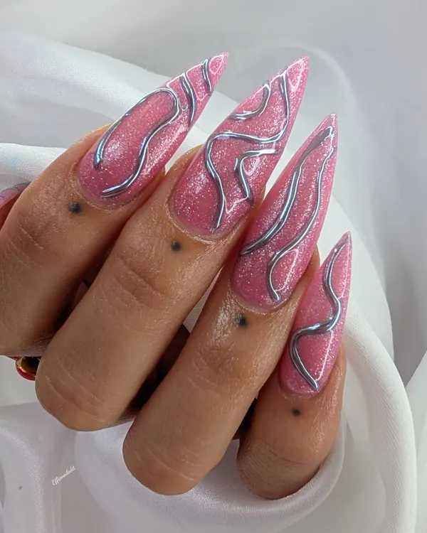 Pink glitter stilettos with chrome swirls nail art by Divine Grace Nails Studio, Edmonton